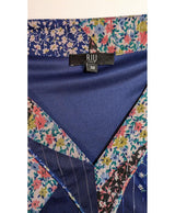 La garantie Once Again : 575002 vêtements d'occasion de marque en état irréprochable.