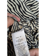 Expérience d'achat simple et satisfaisante pour cette fripe 575011 de qualité, offert par Once Again.