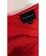 La garantie Once Again : 575039 vêtements d'occasion de marque en état irréprochable.