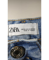 La garantie Once Again : 575308 vêtements d'occasion de marque en état irréprochable.