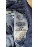 La garantie Once Again : 575321 vêtements d'occasion de marque en état irréprochable.