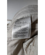La garantie Once Again : 575333 vêtements d'occasion de marque en état irréprochable.