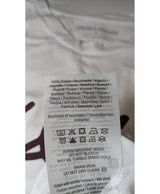 La garantie Once Again : 575338 vêtements d'occasion de marque en état irréprochable.