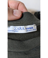 La garantie Once Again : 575550 vêtements d'occasion de marque en état irréprochable.