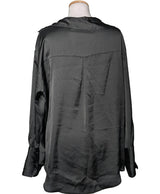 La garantie Once Again : 575557 vêtements d'occasion de marque en état irréprochable.