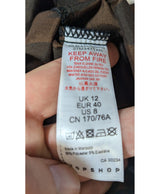 Élégance responsable avec cette pièce vintage 575581 en parfait état, sélectionnée par Once Again.