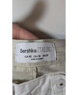 La garantie Once Again : 575584 vêtements d'occasion de marque en état irréprochable.