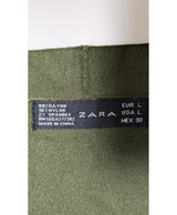 La garantie Once Again : 575630 vêtements d'occasion de marque en état irréprochable.