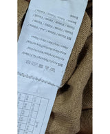 La garantie Once Again : 575722 vêtements d'occasion de marque en état irréprochable.