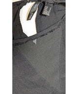 La garantie Once Again : 575774 vêtements d'occasion de marque en état irréprochable.