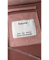 La garantie Once Again : 575800 vêtements d'occasion de marque en état irréprochable.