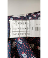 La garantie Once Again : 575831 vêtements d'occasion de marque en état irréprochable.
