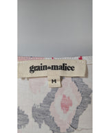 La garantie Once Again : 576175 vêtements d'occasion de marque en état irréprochable.