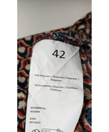 La garantie Once Again : 576185 vêtements d'occasion de marque en état irréprochable.