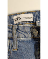 La garantie Once Again : 576320 vêtements d'occasion de marque en état irréprochable.