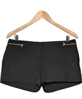 La garantie Once Again : 576432 vêtements d'occasion de marque en état irréprochable.
