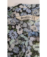 La garantie Once Again : 576457 vêtements d'occasion de marque en état irréprochable.