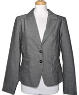 La garantie Once Again : 576573 vêtements d'occasion de marque en état irréprochable.