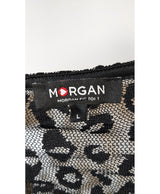 La garantie Once Again : 576636 vêtements d'occasion de marque en état irréprochable.