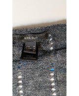 La garantie Once Again : 576992 vêtements d'occasion de marque en état irréprochable.