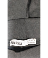 La garantie Once Again : 577112 vêtements d'occasion de marque en état irréprochable.