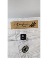 La garantie Once Again : 577145 vêtements d'occasion de marque en état irréprochable.