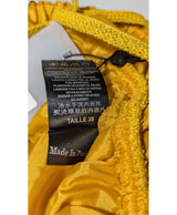 La garantie Once Again : 577526 vêtements d'occasion de marque en état irréprochable.
