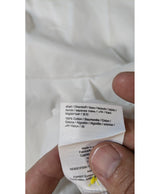 La garantie Once Again : 577711 vêtements d'occasion de marque en état irréprochable.
