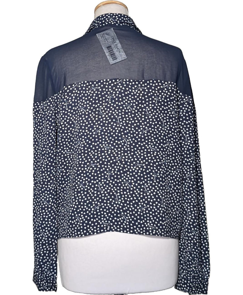 La garantie Once Again : 577764 vêtements d'occasion de marque en état irréprochable.