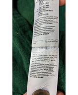 La garantie Once Again : 578321 vêtements d'occasion de marque en état irréprochable.