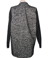 La garantie Once Again : 578370 vêtements d'occasion de marque en état irréprochable.