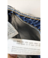 La garantie Once Again : 578406 vêtements d'occasion de marque en état irréprochable.