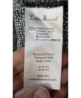 La garantie Once Again : 578421 vêtements d'occasion de marque en état irréprochable.
