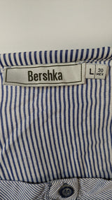 La garantie Once Again : 578655 vêtements d'occasion de marque en état irréprochable.
