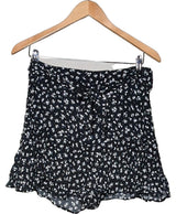 La garantie Once Again : 578932 vêtements d'occasion de marque en état irréprochable.