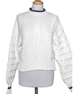 La garantie Once Again : 579235 vêtements d'occasion de marque en état irréprochable.