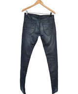 La garantie Once Again : 579300 vêtements d'occasion de marque en état irréprochable.
