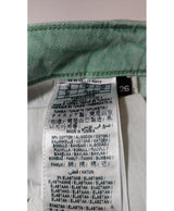 La garantie Once Again : 579306 vêtements d'occasion de marque en état irréprochable.