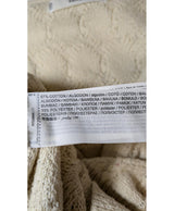 La garantie Once Again : 579324 vêtements d'occasion de marque en état irréprochable.