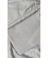 La garantie Once Again : 579696 vêtements d'occasion de marque en état irréprochable.