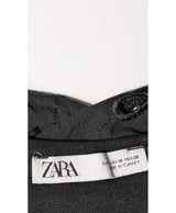 La garantie Once Again : 579727 vêtements d'occasion de marque en état irréprochable.