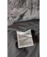 La garantie Once Again : 579735 vêtements d'occasion de marque en état irréprochable.