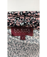 La garantie Once Again : 579875 vêtements d'occasion de marque en état irréprochable.