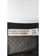 La garantie Once Again : 579919 vêtements d'occasion de marque en état irréprochable.
