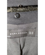 La garantie Once Again : 579954 vêtements d'occasion de marque en état irréprochable.
