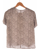 258876 Tops et t-shirts MANGO Occasion Vêtement occasion seconde main