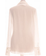 318501 Chemises et blouses MANGO Occasion Vêtement occasion seconde main
