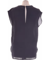 364916 Tops et t-shirts MANGO Occasion Vêtement occasion seconde main