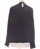 370921 Tops et t-shirts MANGO Occasion Vêtement occasion seconde main