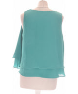 373193 Tops et t-shirts MANGO Occasion Vêtement occasion seconde main